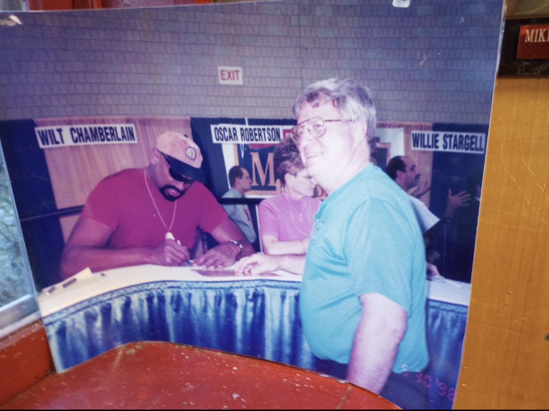 Todd Tilford's father meeting Wilt Chamberlain and having him sign the program from his 100-point game on March 2, 1962